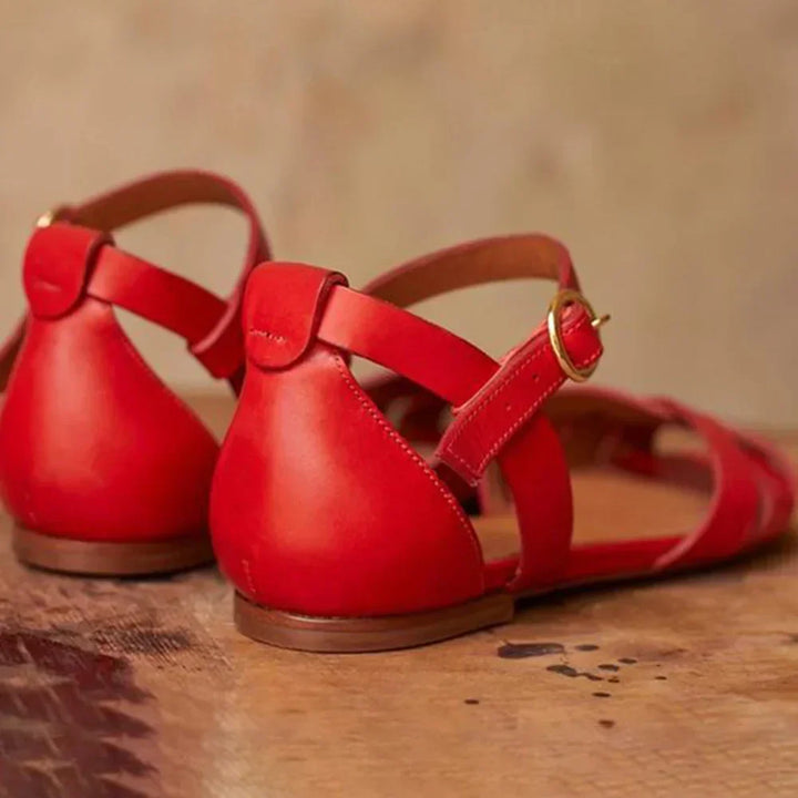 FLACHE SANDALEN MIT RIEGELN